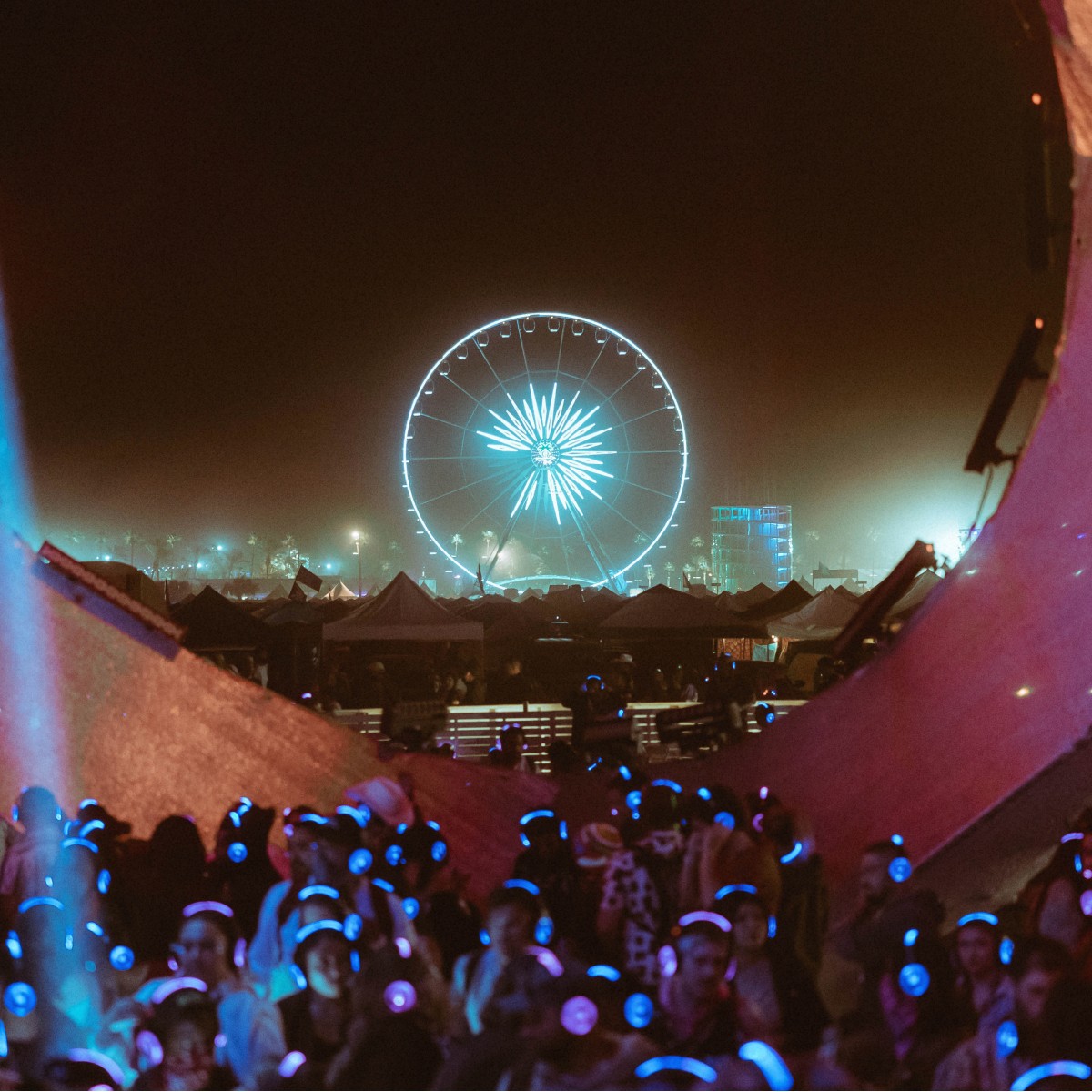 Coachella ferris wheel at night from campgrounds