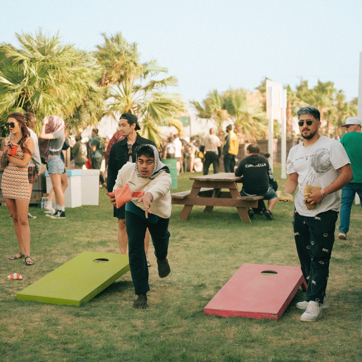 Coachella campers playing corn hole